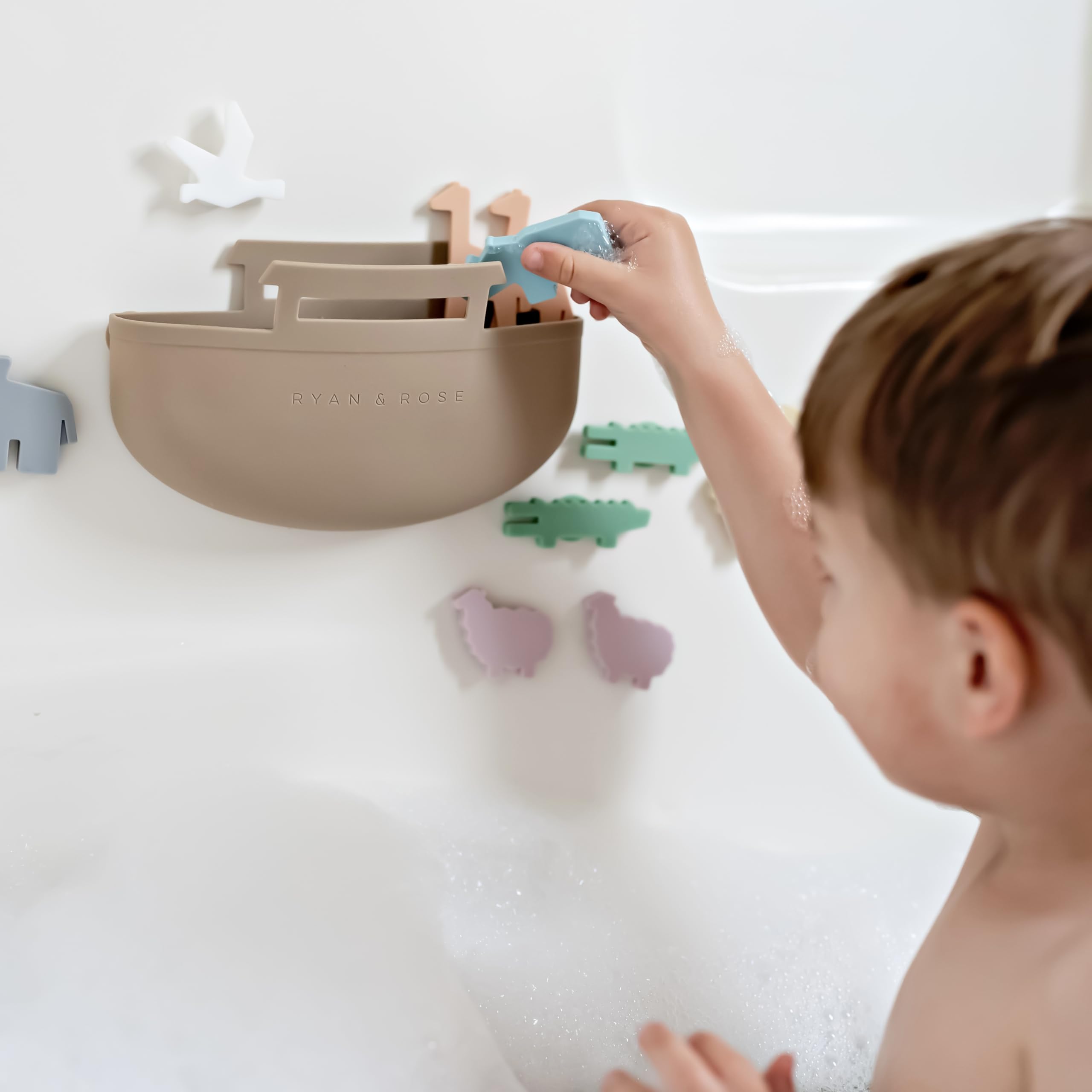 Ryan & Rose Noah's Ark with suction sticks to tub walls.