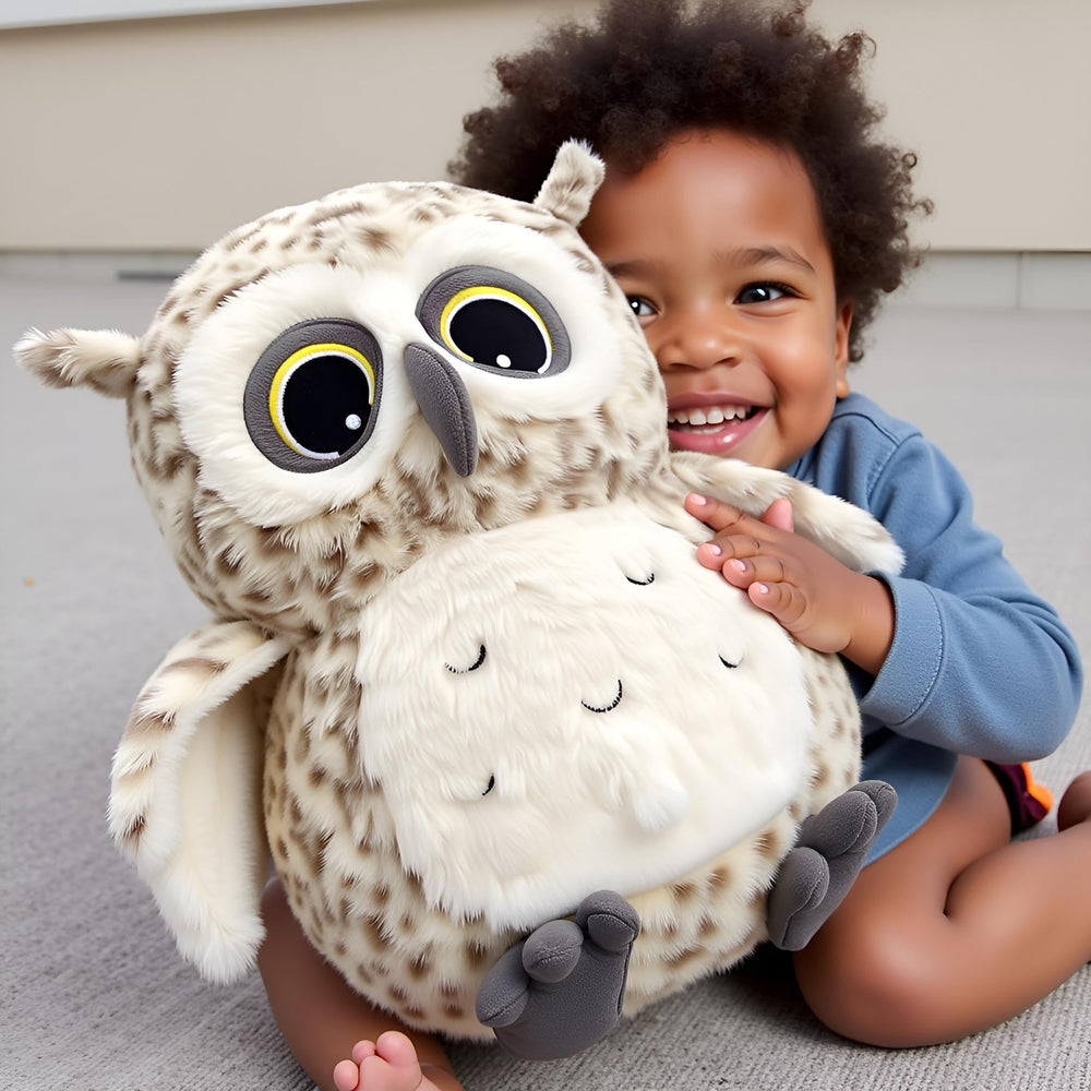 Ryttir snowy owl plush reveals subtle down under wings for tactile discovery.