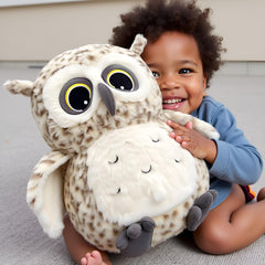 Ryttir snowy owl plush reveals subtle down under wings for tactile discovery.