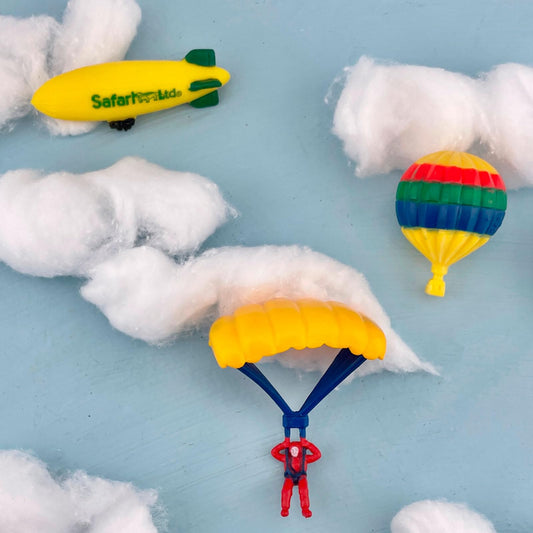 Safari Ltd In The Sky TOOB airplane figurine promotes imaginative travel stories.