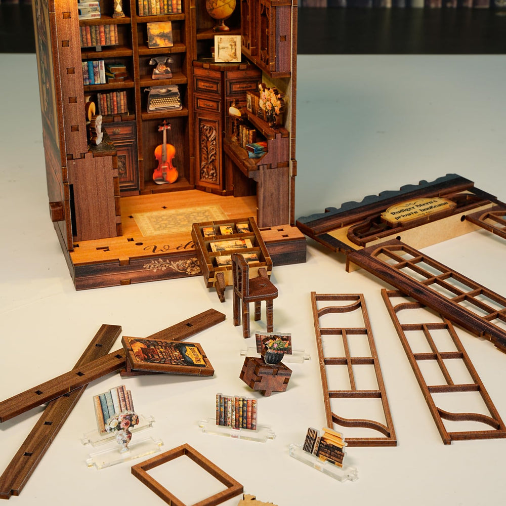 Sagiterra Book Nook Kit: DIY miniature room interior for cozy bookshelf decor.