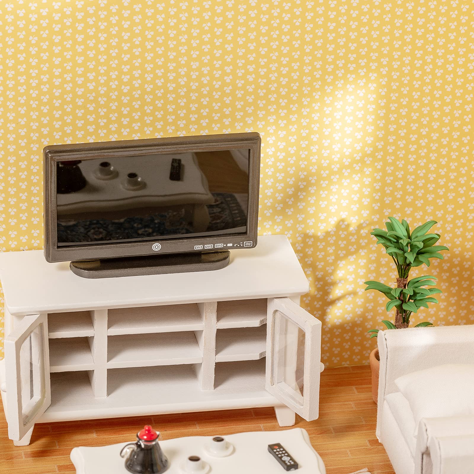 SAMCAMI miniature pillows add color and texture to seating in the dollhouse.