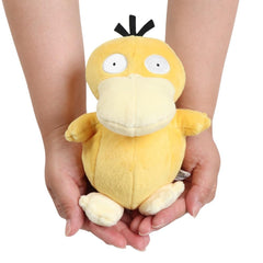 Sanei Psyduck plush in hand, demonstrates size and portability.