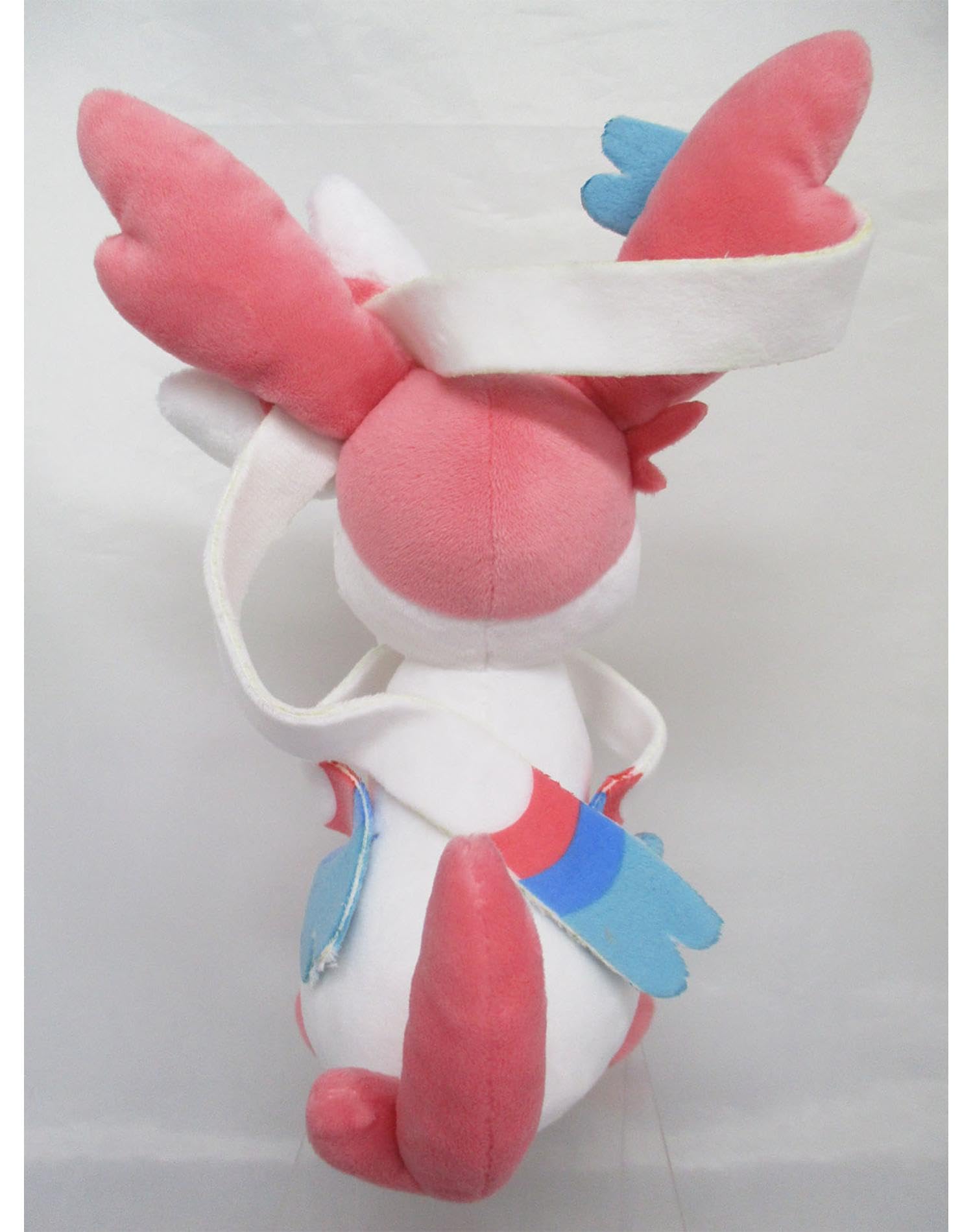 Sanei Sylveon plush tail crescent adds charm to any shelf.