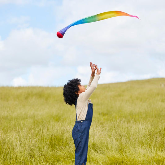 Sarah's Silks Skytail soft red ball enhances safe throwing and catching.