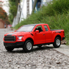 SASBSC F150 red truck with open doors for interactive play.