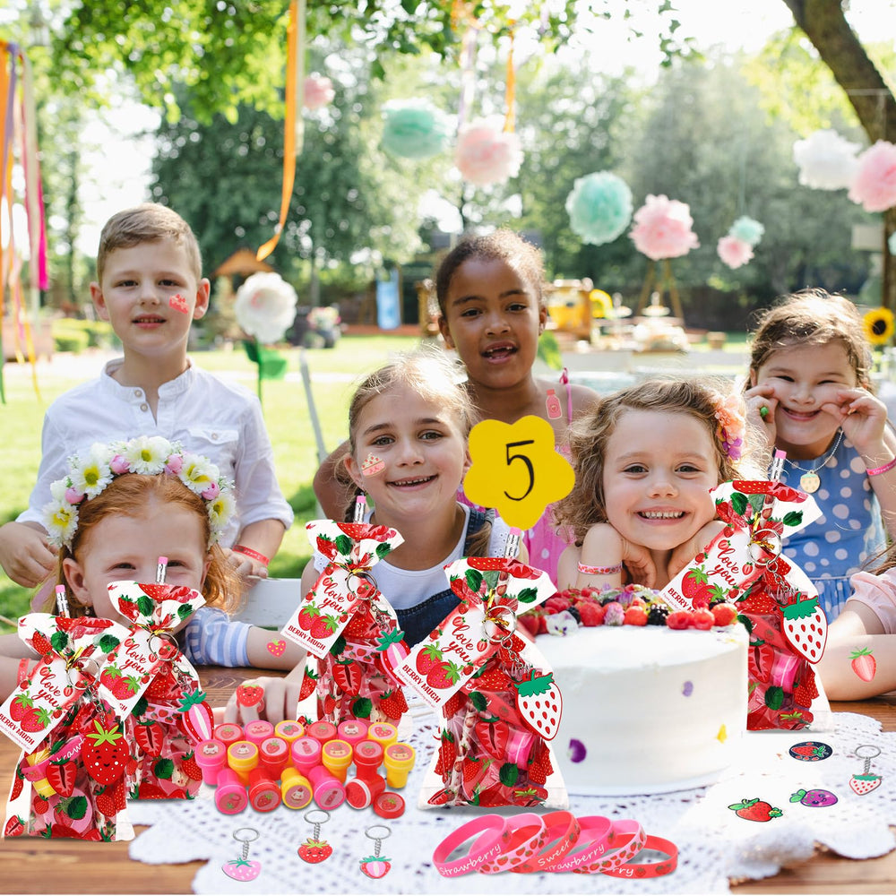 Sayglossy strawberry tattoos for playful party accents.