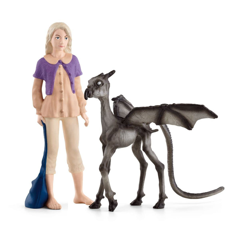 Schleich Luna Lovegood figurine with purple cardigan for collector display.