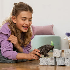 Schleich rock-textured rhino skin shows rugged details for immersive fantasy play.
