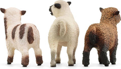 Rustic farm backdrop with Schleich sheep enhances realism.
