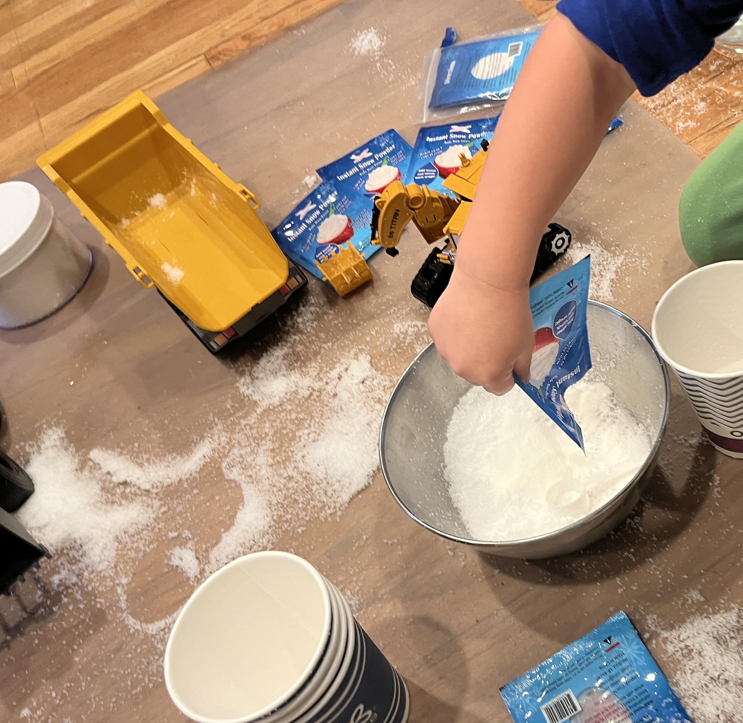 Science Gone Fun instant snow powder poured and fluffed in a bowl for experiments