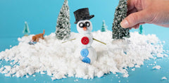 Science Gone Fun instant snow powder forming a snowman after chilling