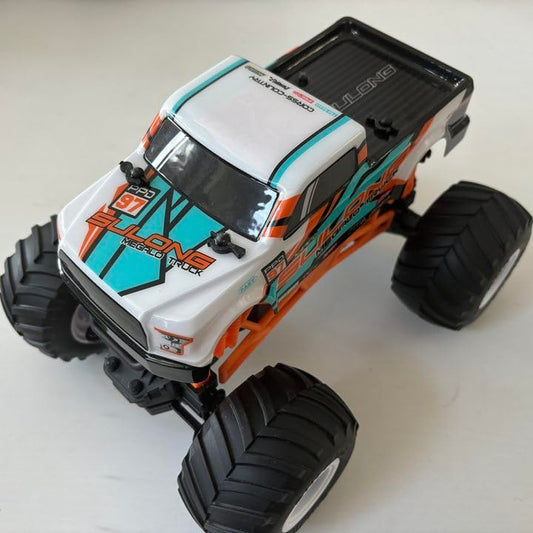 Scientoy monster truck with off-road tires for stable outdoor handling.
