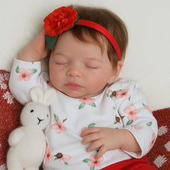 SCOM 20-inch reborn doll face close-up with lifelike veins and gentle blush for nurturing play.
