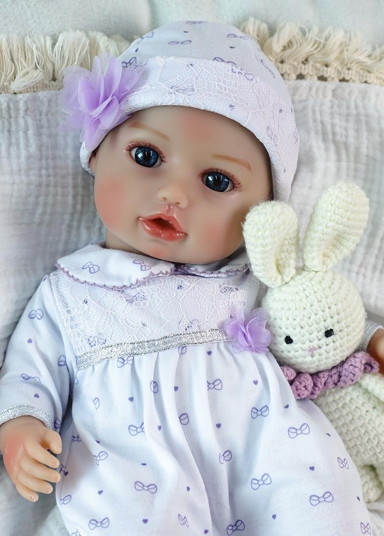 SCOM 16-inch baby doll with soft-cloth body for imaginative play.