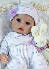 SCOM 16-inch baby doll with soft-cloth body for imaginative play.