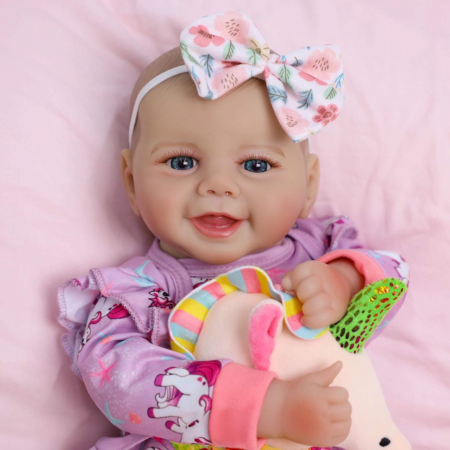 SCOM 18-inch doll in soft clothing for 3+ year olds.
