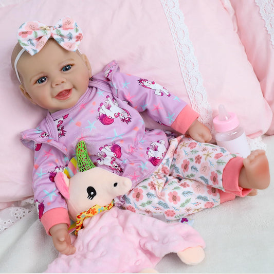 SCOM doll face with hand-sewn eyelashes for gentle, lifelike detail.