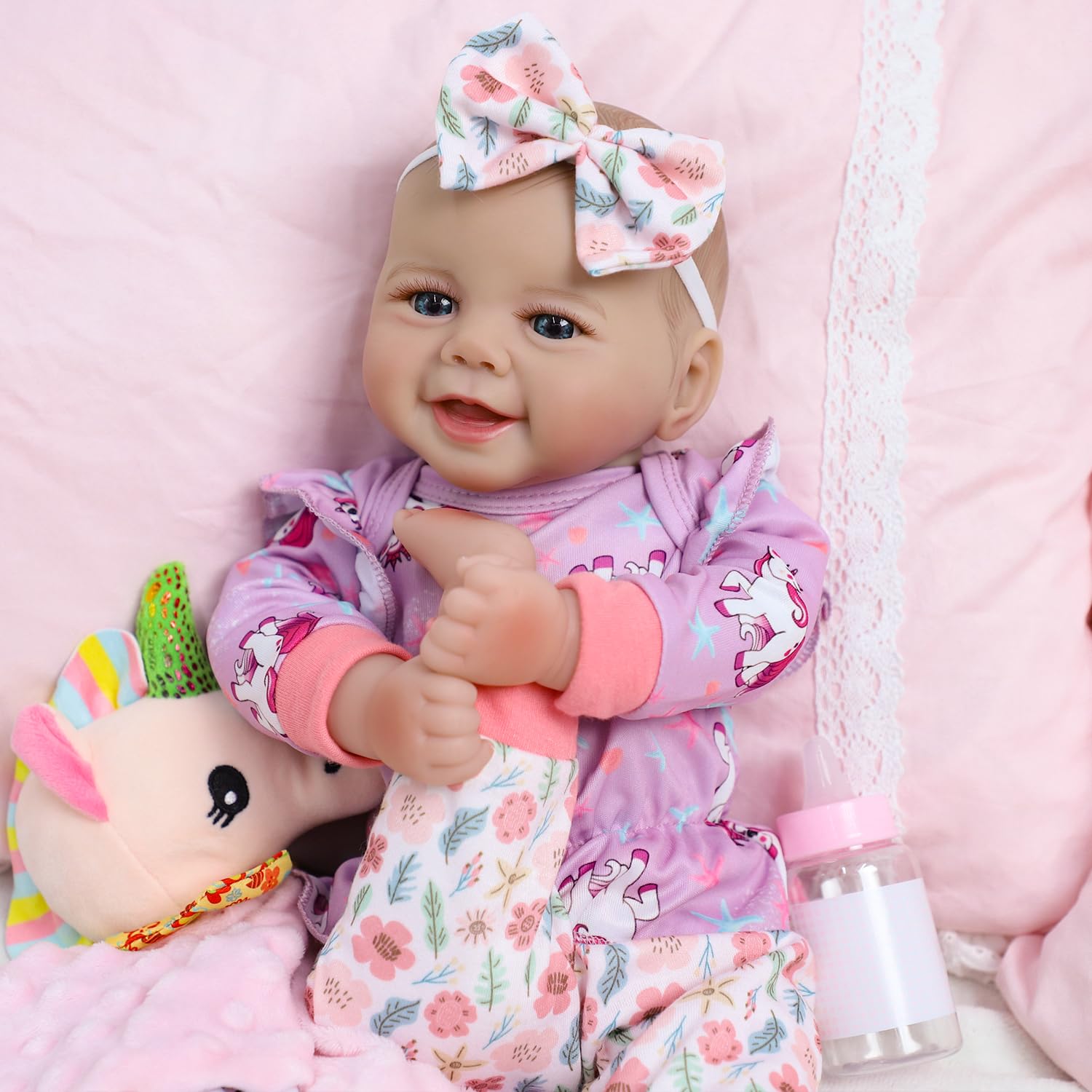 SCOM 18-inch baby-doll skin texture close-up showing baby-soft, plush skin.