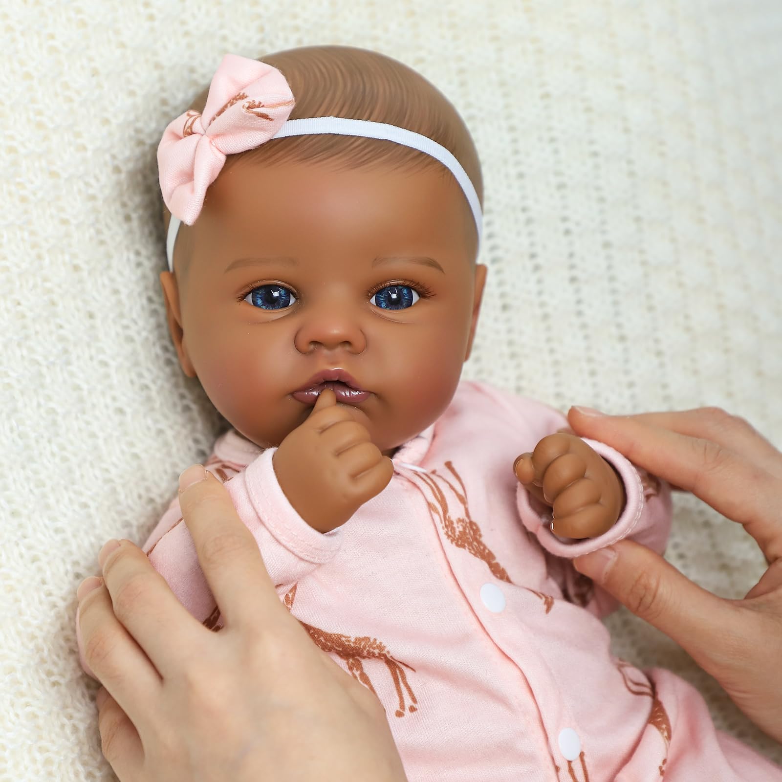 SCOM Black 18-inch bottle supports feeding-themed pretend play and nurturing moments.