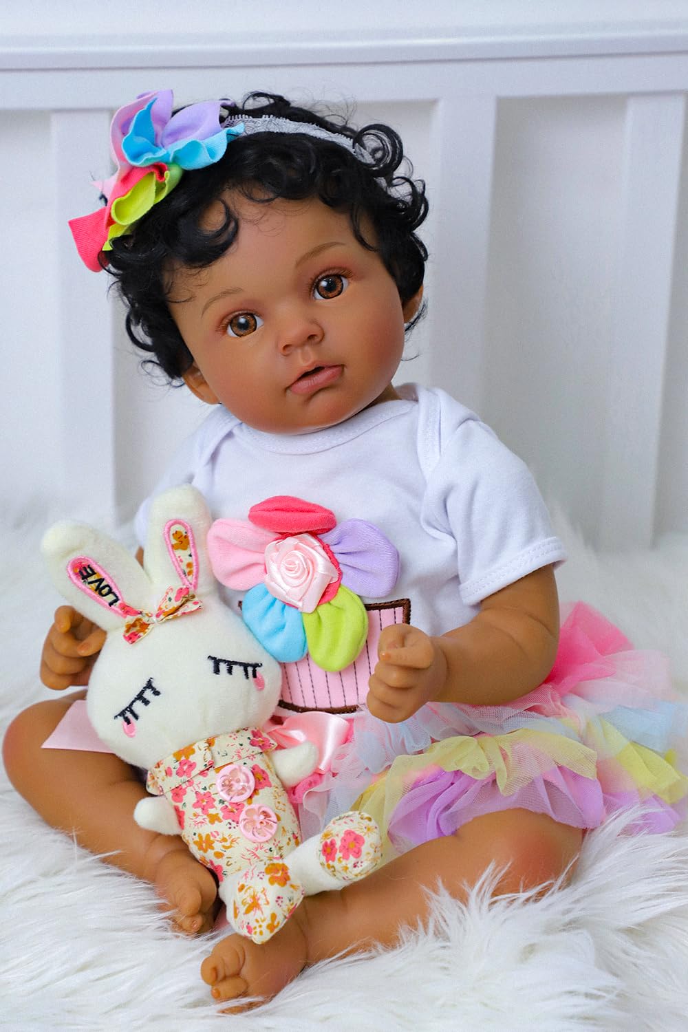 SCOM gift box includes pacifier, bottle, outfit, headband, and birth certificate
