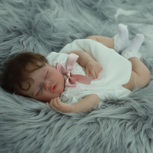 SCOM Quinbee eyes closed face detail with serene newborn look for gentle role-play.
