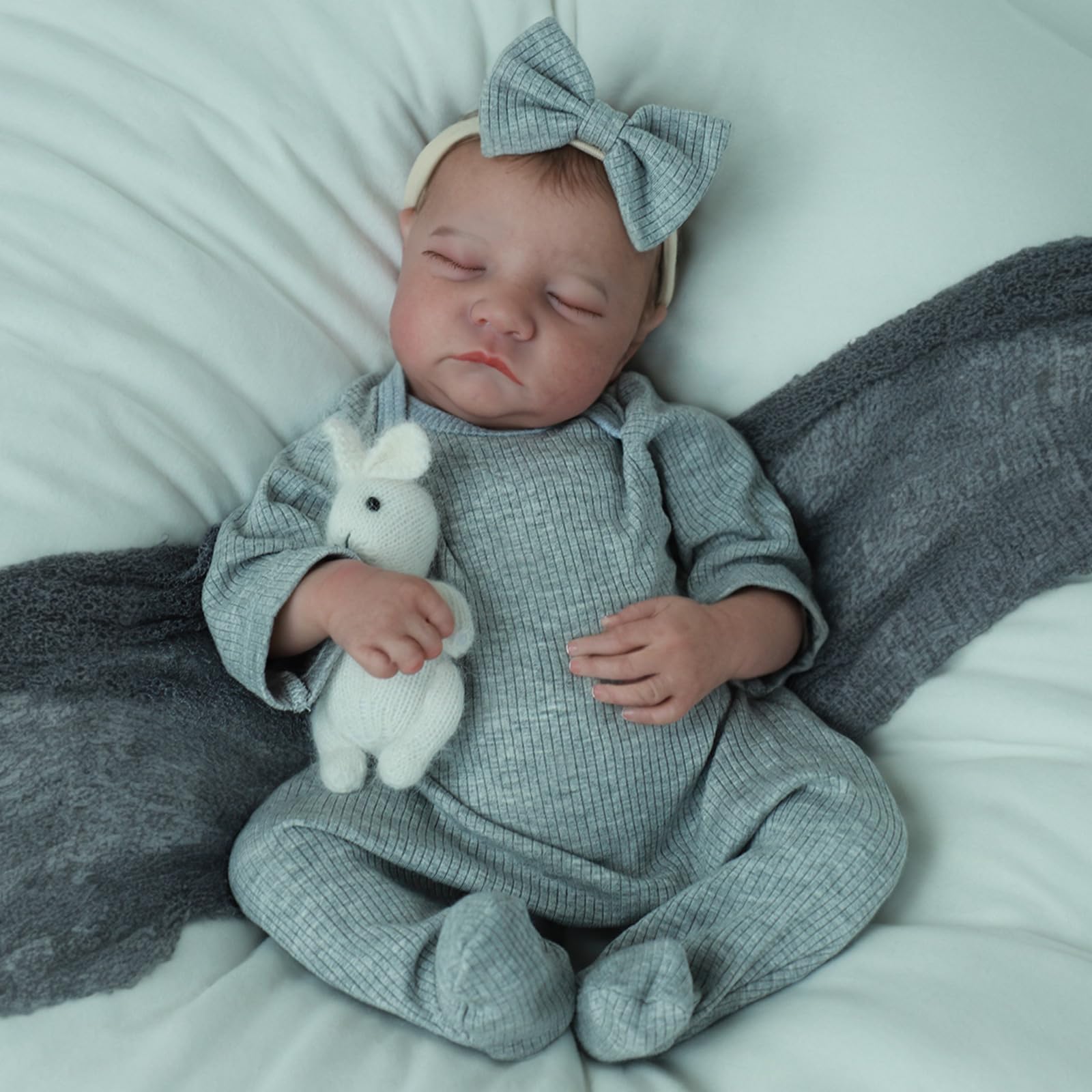 SCOM realistic reborn doll with hand-drawn hair enhances pretend play.