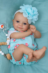 SCOM Flynn play-ready pose with bottle and pacifier in use