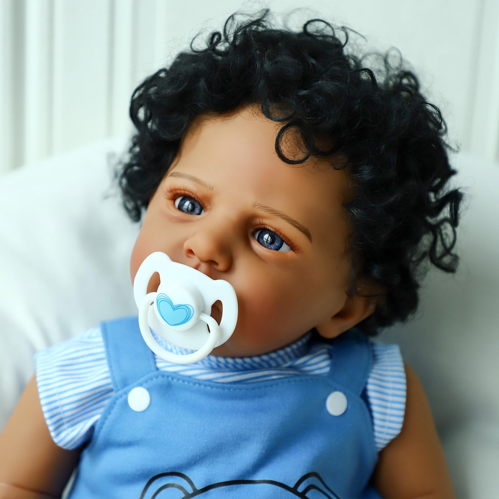 SCOM Reborn Black Boy doll, 20in full view, weighted for authentic cuddling.