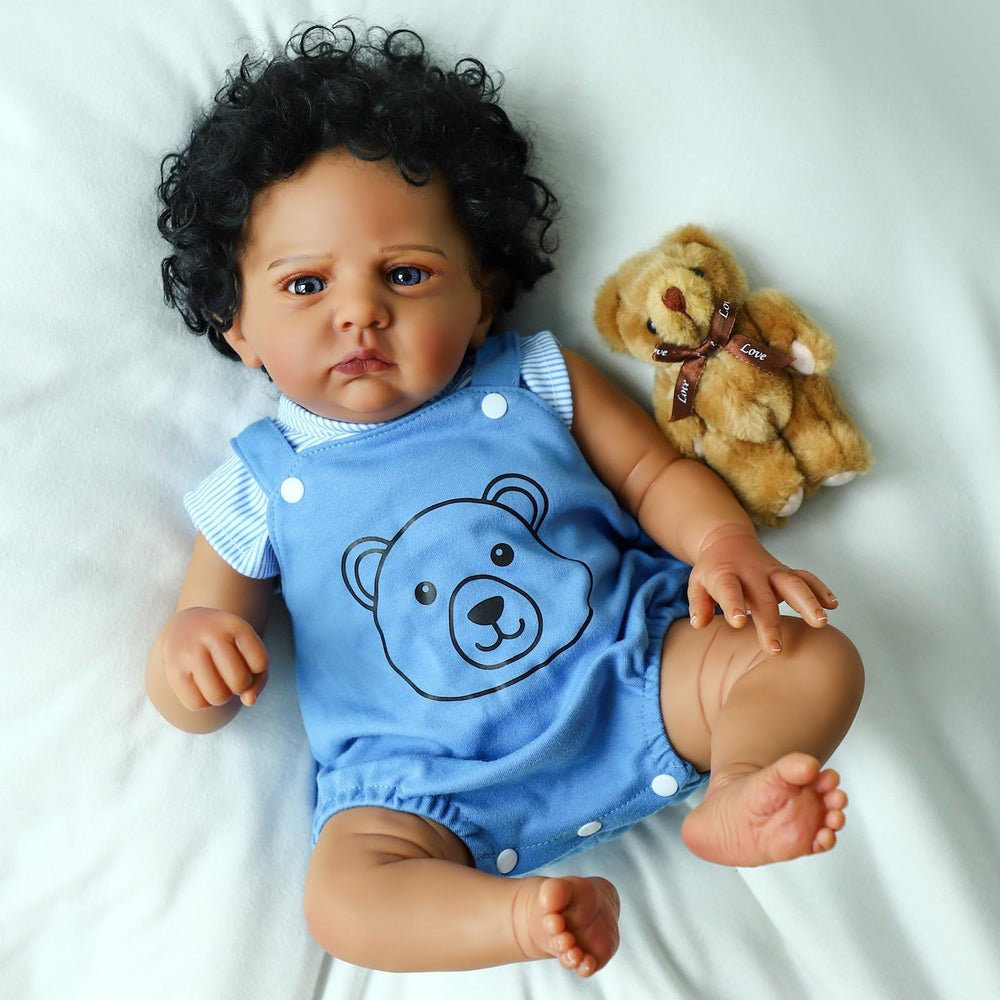 SCOM Reborn Black Boy doll face with lifelike features for nurturing play.