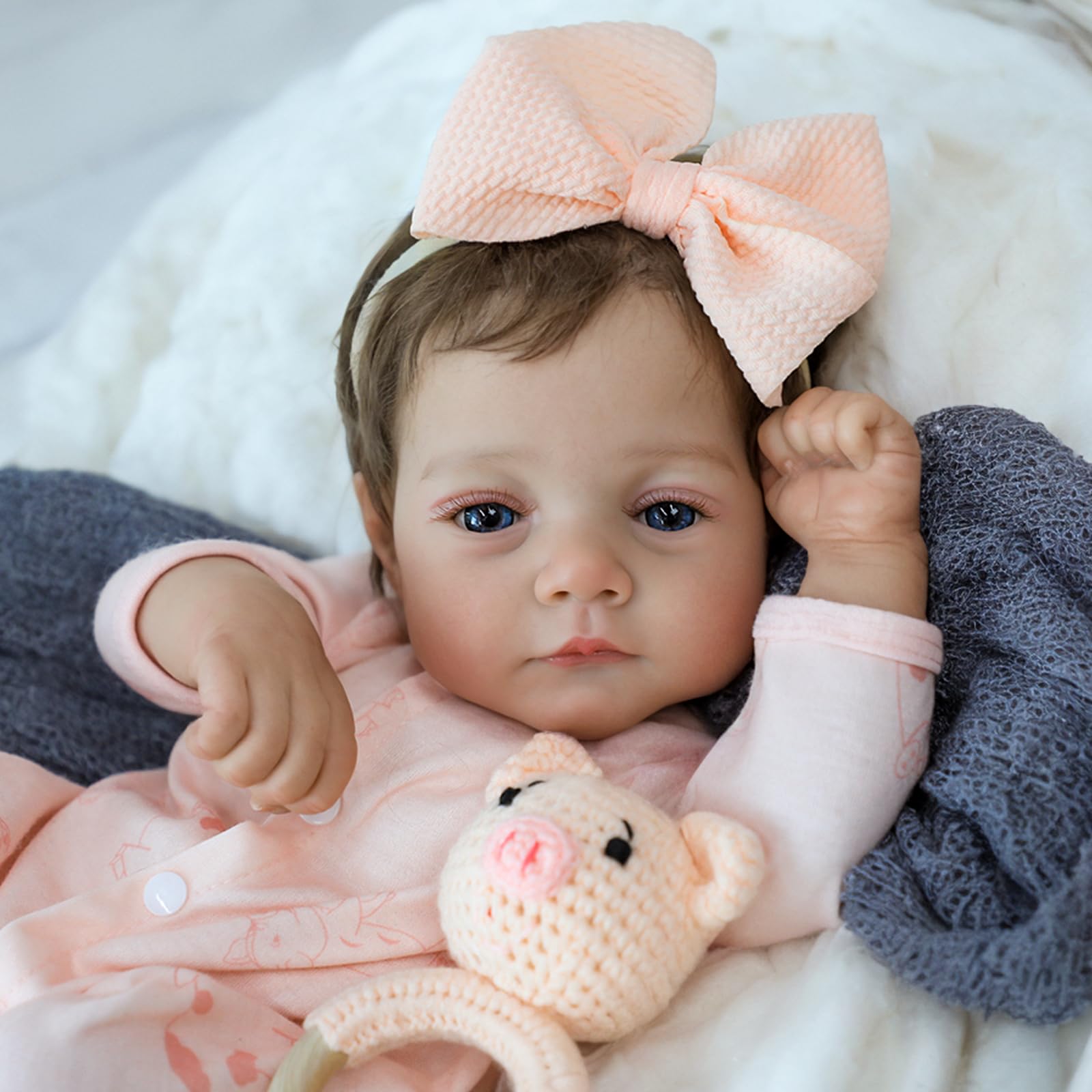 SCOM Lily face close-up showing lifelike features for cuddling and pretend play