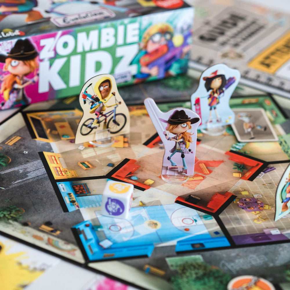 A group sits at a table enjoying cooperative play with Scorpion Masqué Zombie Kidz Evolution.
