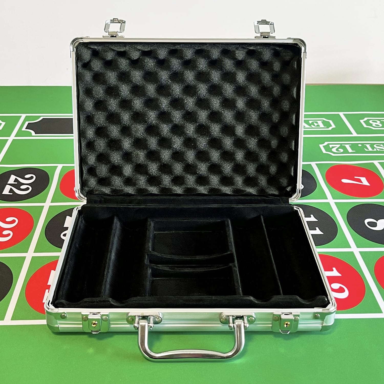 SEETOOOGAMES empty aluminum poker chip case interior with felt, organized space for chips and cards.