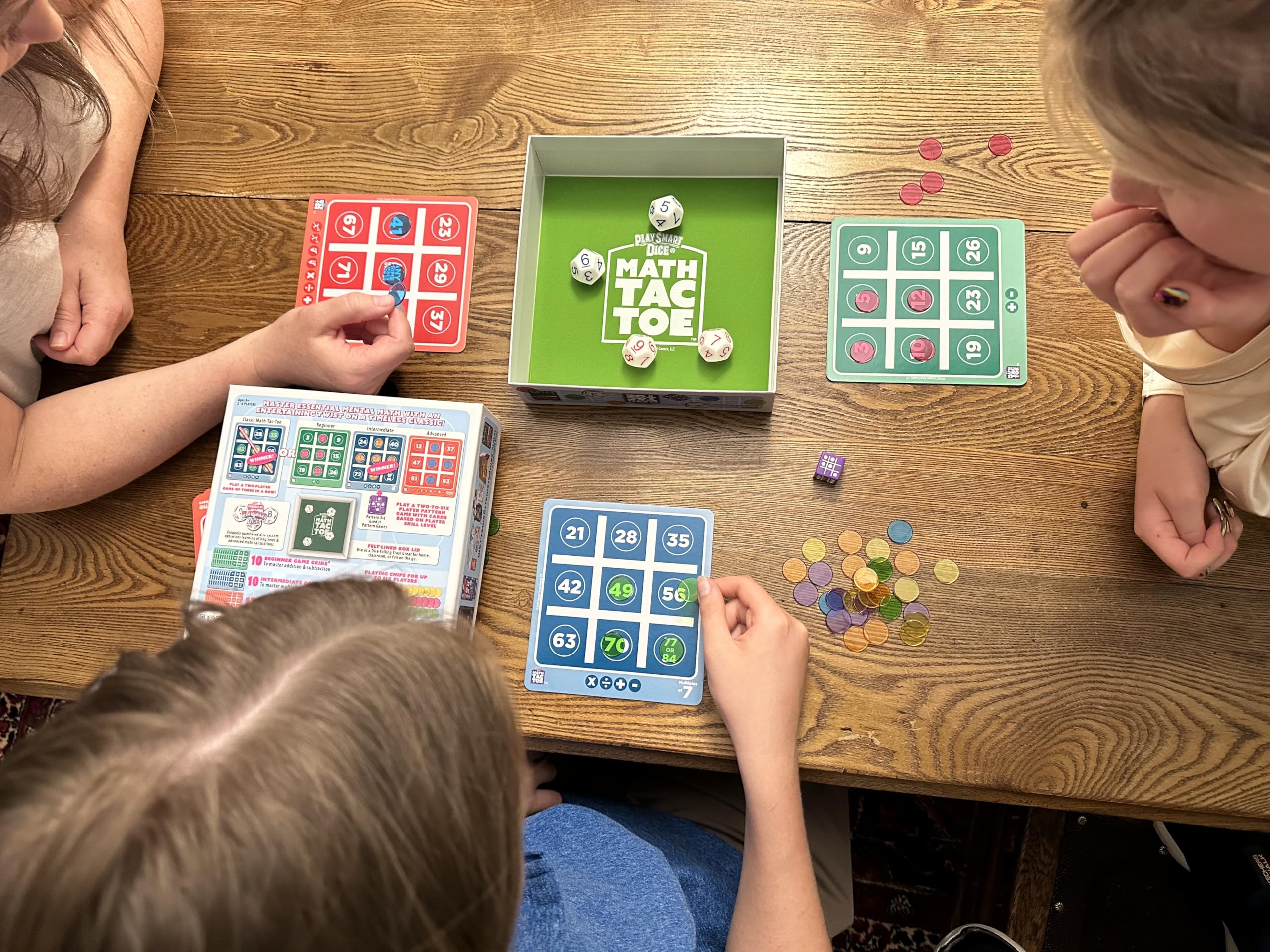 Semper Smart Games PlaySmart Dice Math-Tac-Toe dice close-up with color-coded faces