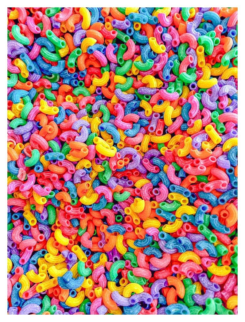 Sensory-N-Stuff rainbow elbow pasta adds vibrant color to sensory bins for creative exploration.