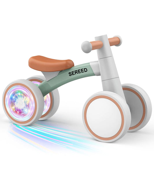 SEREED green balance bike with colorful lighting wheel in action for toddlers.