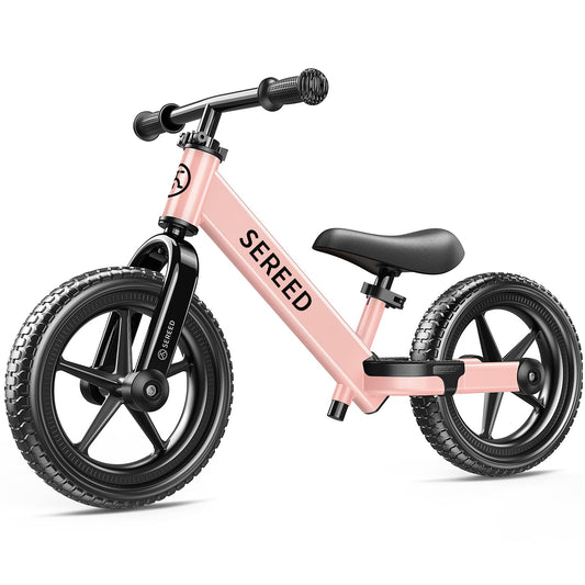 SEREED pink toddler balance bike frame for growing riders.