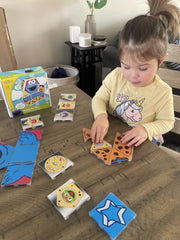 Sesame Street kids using magnets to build and learn together.