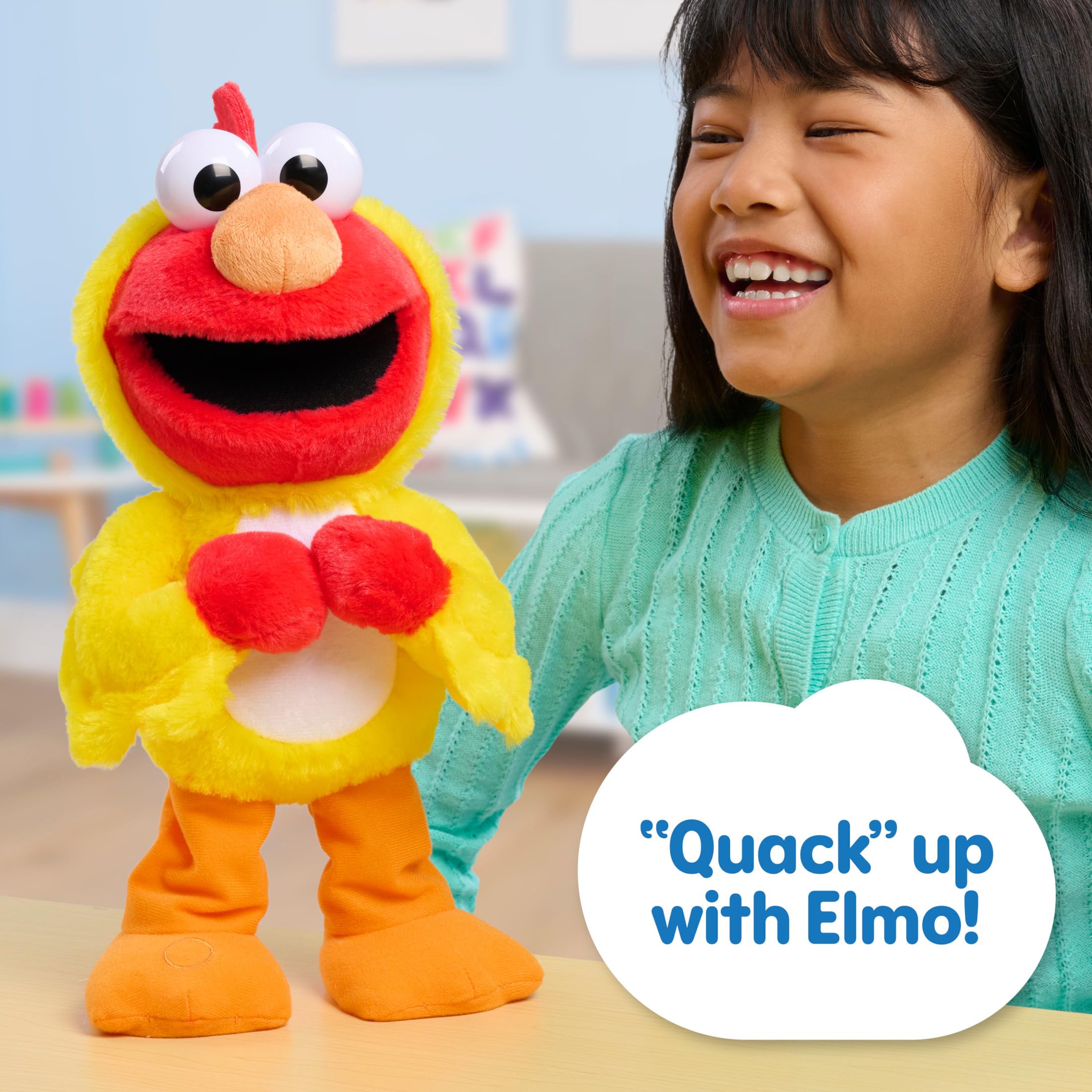 Sesame Street Elmo interactive plush demonstrates dancing and giggling with Elmo’s playful motions.