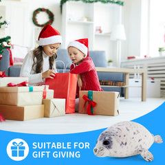 Sew Butiful seal plush cuddled by a child for comforting playtime