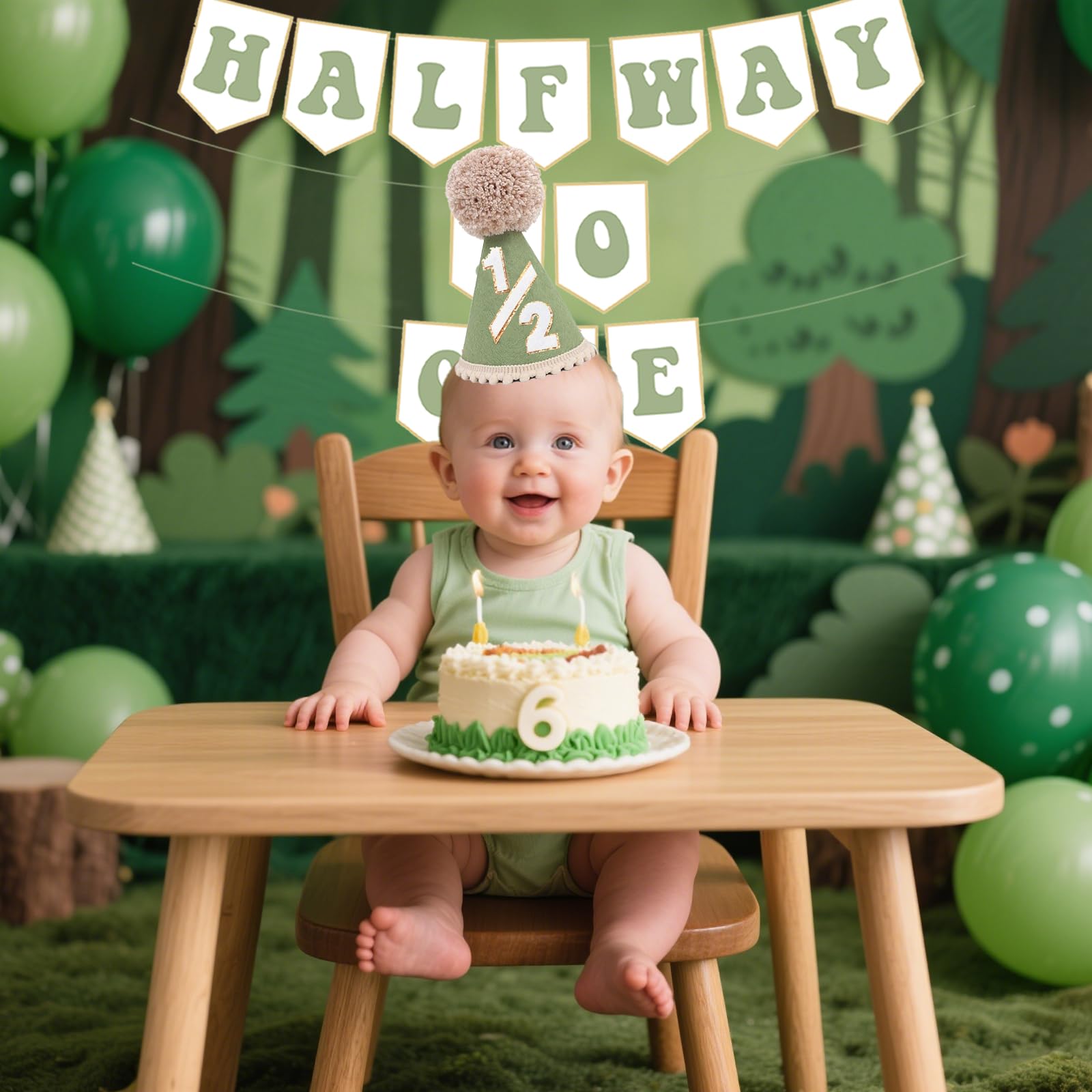 Baby wearing Shanmorine sage green half birthday hat during celebration.
