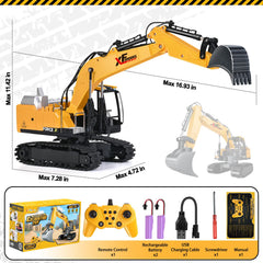Shemira RC excavator on grass demonstrates durable rubber tracks for varied terrain