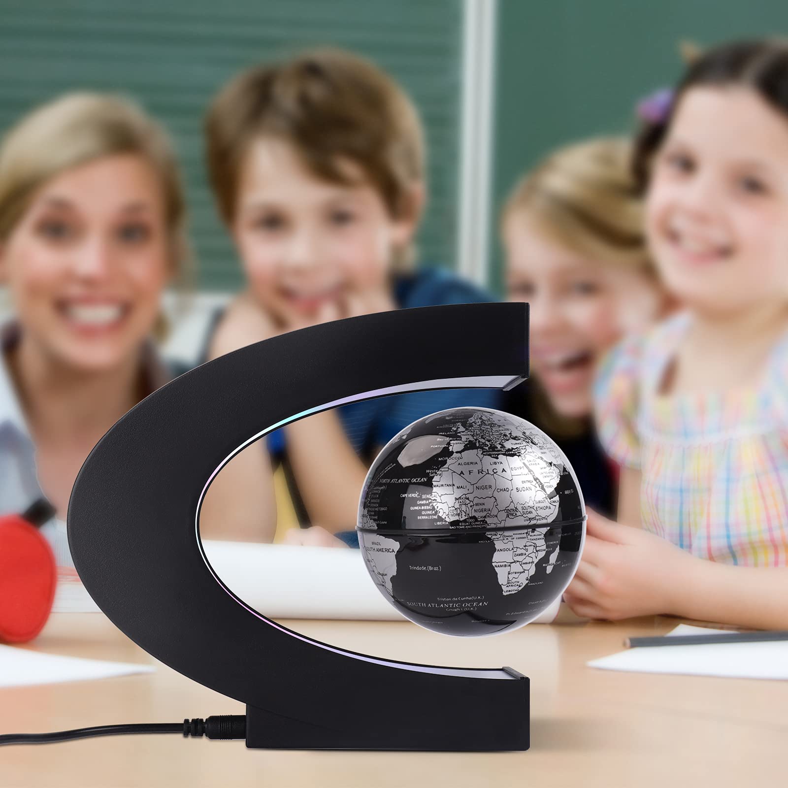 Shoclematirul globe on a desk setup highlights innovative decor for workspaces