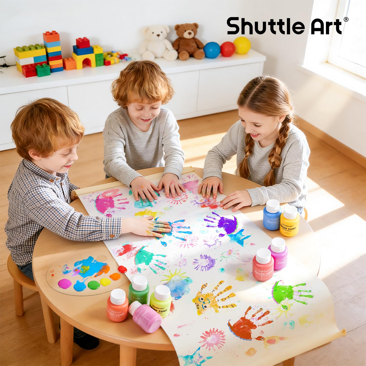 Shuttle Art fosters creative learning with safe finger painting.