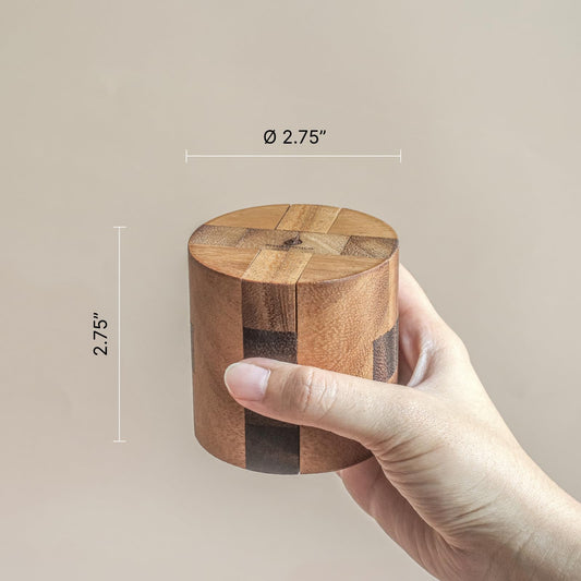 Powder Keg close-up shows smooth monkeypod grain and tactile satisfaction.