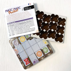 Sit Down! Magic Maze Pocket heroes and loot pieces on table.