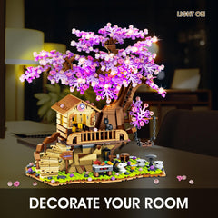 Sitodier LED-lit tree house enhances cozy play after dark.