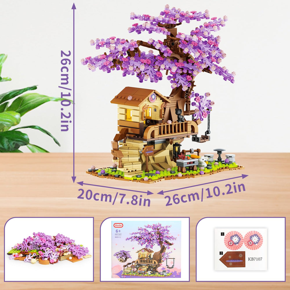 Sitodier cherry blossom tree house creates a tranquil night ambiance with light.