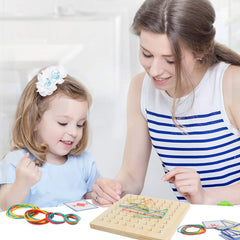 Skrtuan kids using geoboard with patterns encourages creativity.