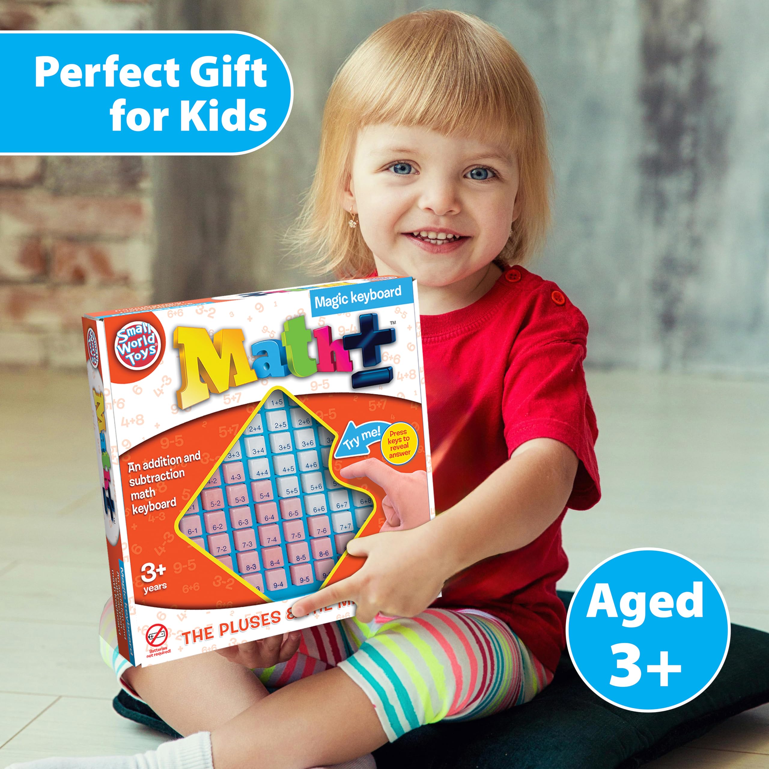 Small World Toys toy keyboard on a flat surface shows durable, kid-friendly design.
